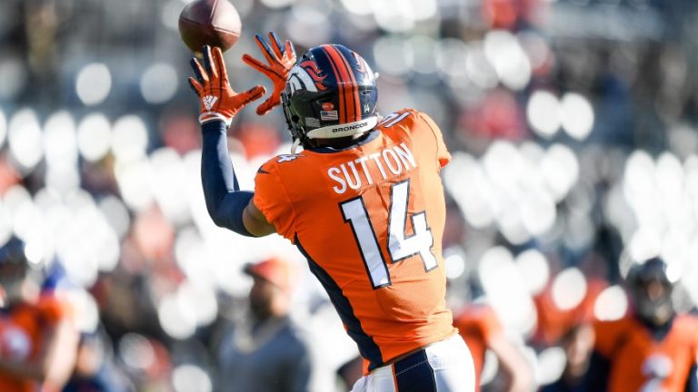 Courtland Sutton featured in the Week 6 Fantasy Football Player Rankings Tiers Start Sit QB RB WR TE catches a ball on the sidelines.