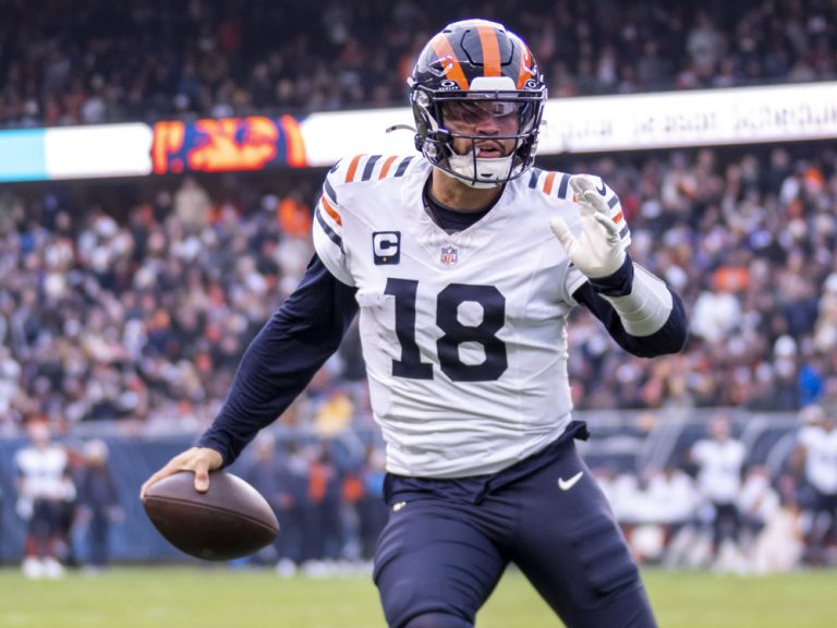 Week 6 Fantasy Football Start/Sit Advanced Stats guide features Caleb Williams of the Chicago Bears as he rushes toward the end zone.
